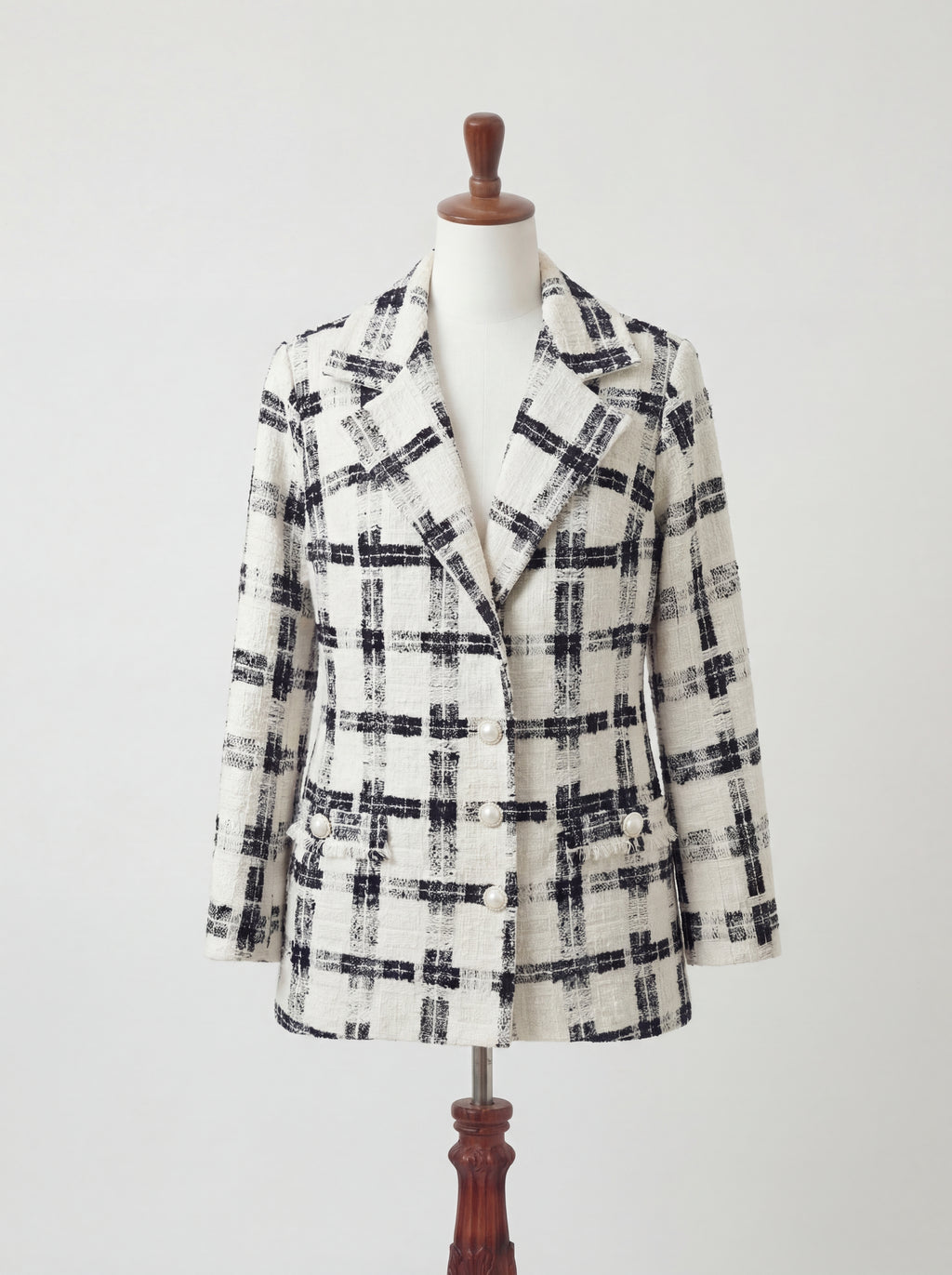 Veston tweed noir et blanc à carreaux