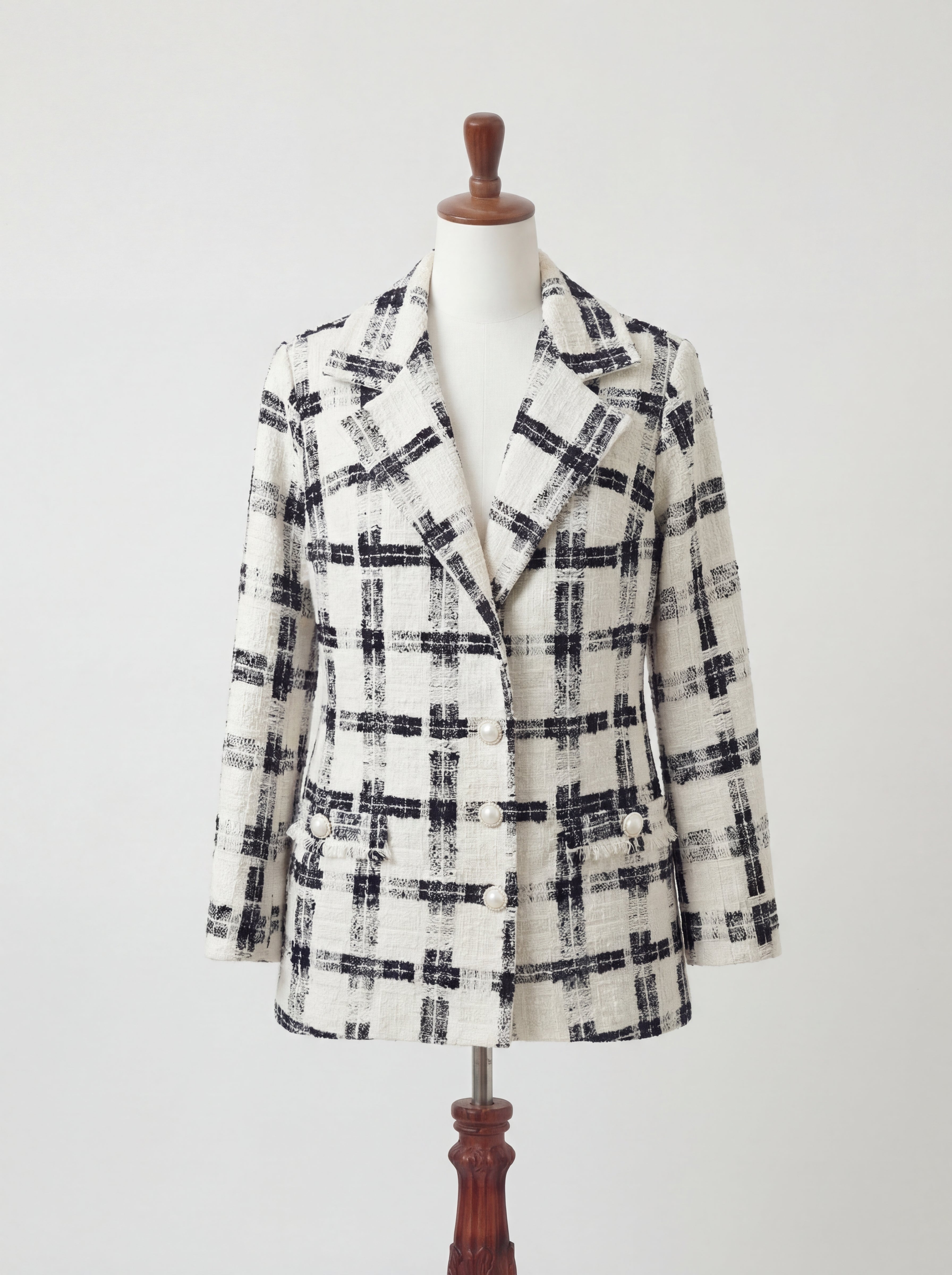 Veston tweed noir et blanc à carreaux
